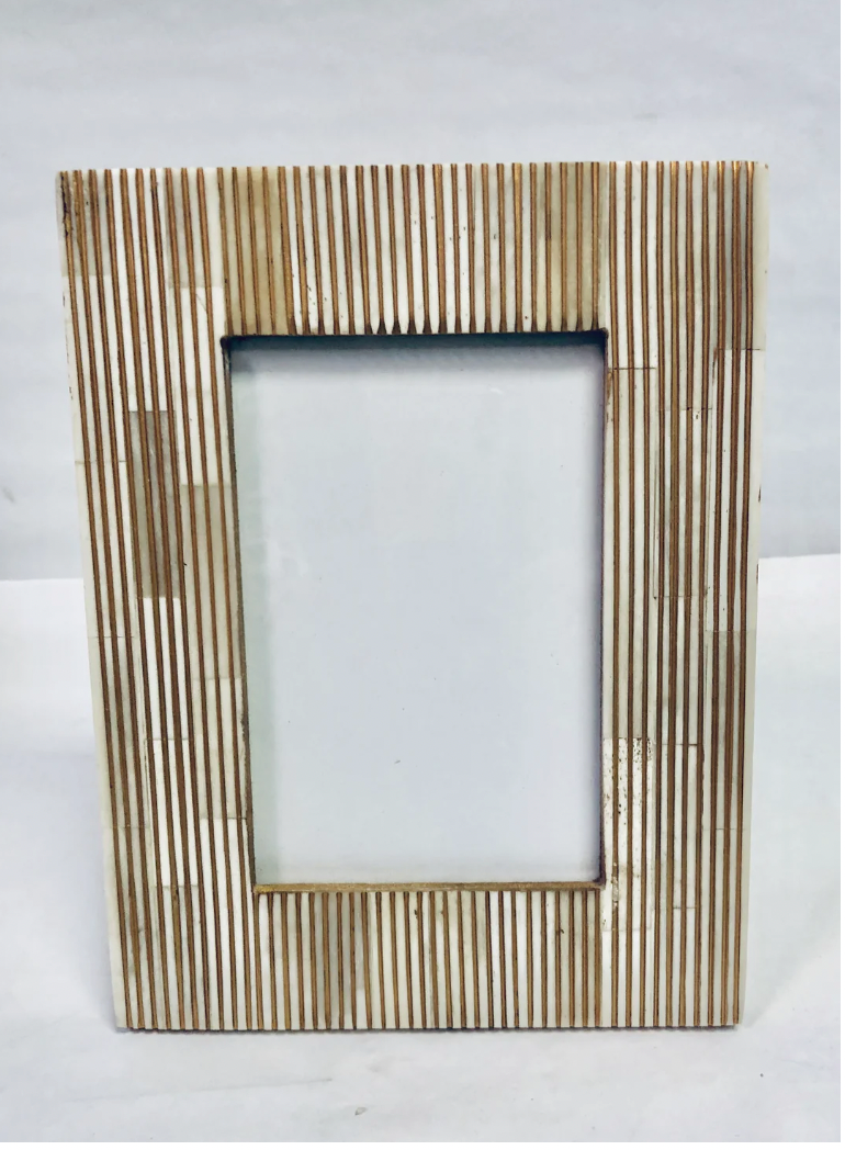 Bone and Gold hand carved lined frame