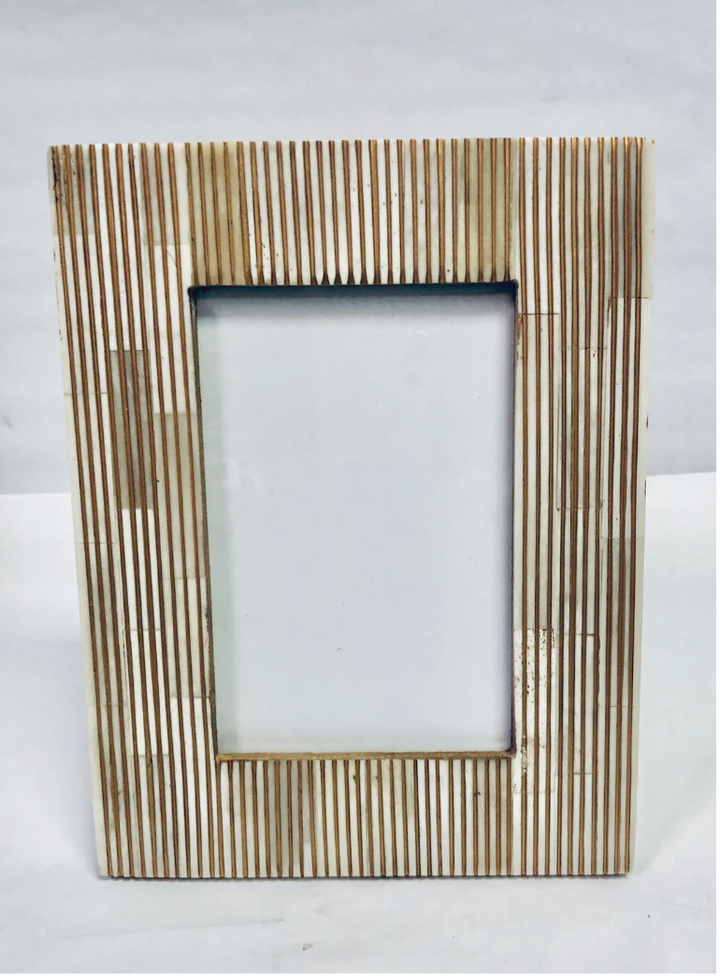 Bone and Gold hand carved lined frame